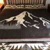 Brown blanket with Mt Hood and skier, geometric border