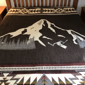 Brown blanket with Mt Hood and skier, geometric border