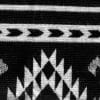 Closeup of Black and White Native geometric pattern couch throw