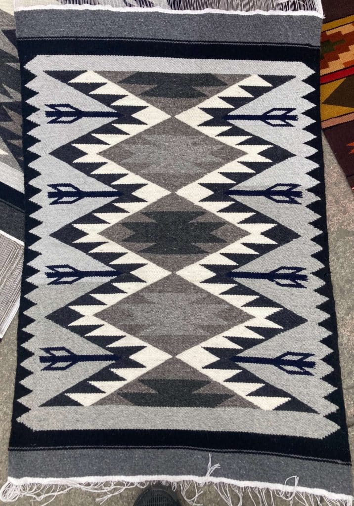 Handwoven wool rug in gray, black and white