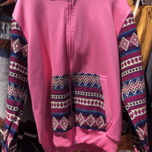Pink hoodie with western pattern sleeves and front pockets.