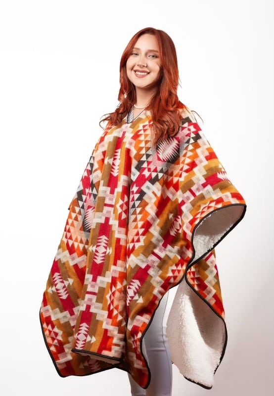 Sherpa lined blanket becomes a poncho with zipper