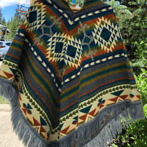 Gray, cream and yellow hooded poncho with Western pattern