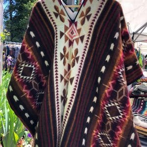 Brown, red and cream poncho with geometric design