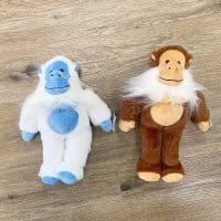 Plush brown Bigfoot or blue and white Yeti figures