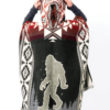 Back view of model wearing hooded Bigfoot poncho in military green with red and orange accents