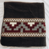 Folded Dark Brown Queen Blanket with Native Andean Cross design in Burgundy and Cream